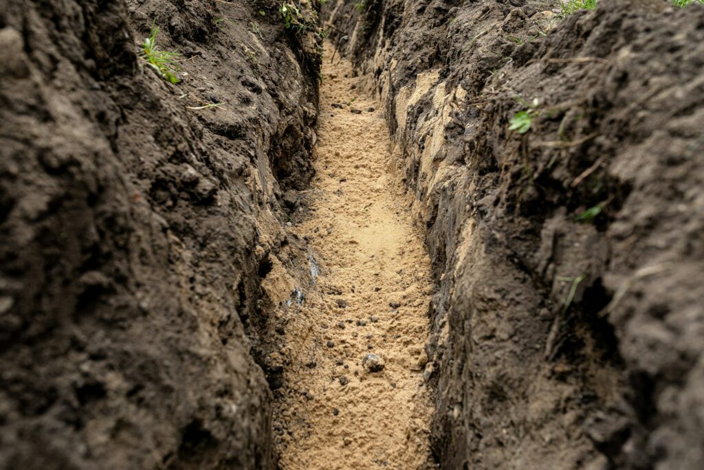 Abwasserrohr verlegen Sandschicht